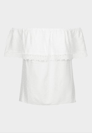 Haut blanc à épaules nues en tissu texturé, avec un col à volants et une bordure en dentelle en bas. Design ample.