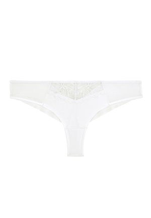 String blanc en dentelle et mesh avec détail de broderie florale sur le panneau avant de la ceinture.