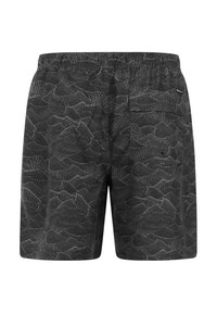 Schwarze Badeshorts mit einem weißen Wellenmuster. Elastischer Bund mit Kordelzug und zwei Gesäßtaschen. Glatte Stoffstruktur.