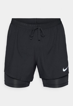 Svarta löparshorts med ett ytterlager, elastisk midja, dragsko och fickor. Har en vit Nike-logotyp och innershorts.