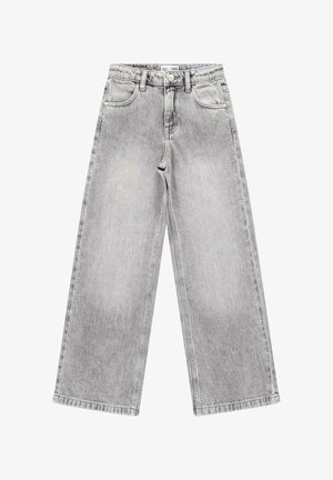 Lichtgrijze jeans met wijde pijpen, een knoop- en ritssluiting aan de voorkant, voorzakken en kleine zilveren studs langs de buitenste naden.