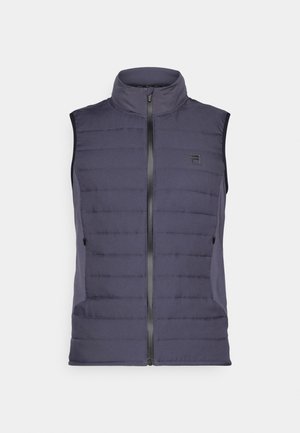 Tumši zila bez piedurknēm vesti, ar kviltotu dizainu un horizontālām šuvēm, priekšējais rāvējslēdzis, stāvošs apkakle, divas sānu kabatas un logotipa detalizācija.