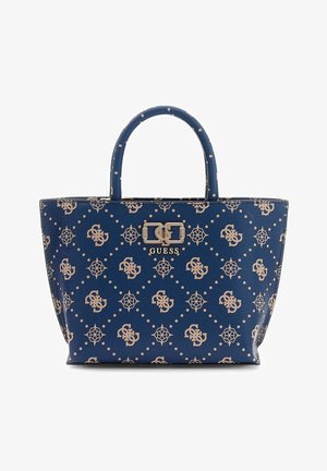 Sac tote Blue Guess avec logo beige et motif décoratif, deux anses et une attache centrale en métal.