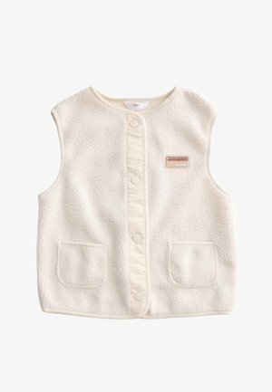 Veste sans manches en polaire crème avec boutons-pression, deux poches avant et un petit patch rectangulaire "Authentic by Design" sur la poitrine.