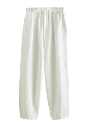 Białe, luźne spodnie z elastycznym pasem i sznurkiem, wykonane z lekkiego materiału, zaprojektowane do noszenia na co dzień.