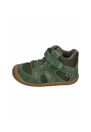 Green suede high-top shoe with mesh accents, textured surface, adjustable strap, and rubber sole. Features a brown trim and logo detail.