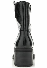 Black leather ankle boot with a shiny finish, zipper closure, stacked heel, and decorative stitching along the back.