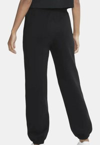 Nike Sportswear Pantalones deportivos - black white
