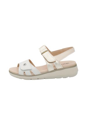 Sandalia blanca y beige para mujer con tiras de velcro, puntera abierta y suela acolchada diseñada para comodidad y soporte.