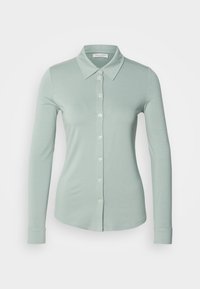 Selected, faded mint