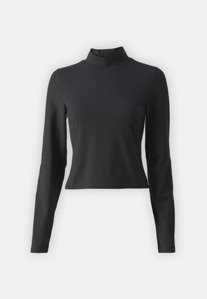 Fekete, hosszú ujjú garbóblúz, puha, rugalmas szövetből készült. Feszes kialakítás, rövid fazon és sima textúra.