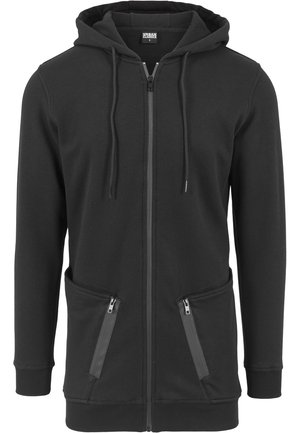 Schwarzer Kapuzenpullover mit durchgehendem Reißverschluss, Kordelzügen, zwei vorderen Mesh-Reißverschlusstaschen, langen Ärmeln sowie gerippten Bündchen und Saum.