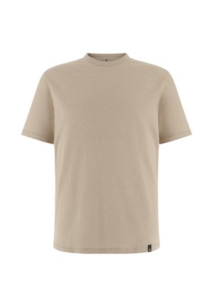 T-shirt beige à manches courtes et col ras du cou avec une petite étiquette noire près de l'ourlet inférieur sur un fond blanc.