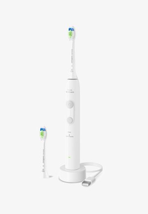 Philips Sonicare elektrische Zahnbürste mit austauschbarem Bürstenkopf, Ladestation und USB-Kabel auf weißem Hintergrund.