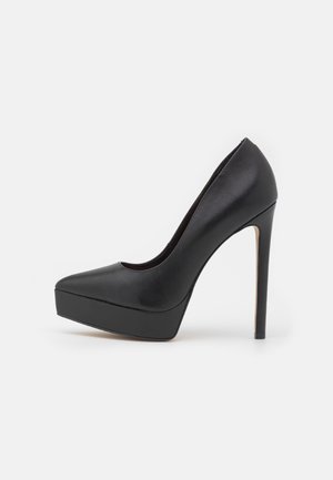 Højhælede pumps - black