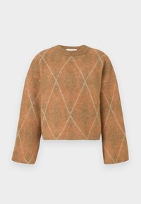 Pull oversized et court de couleur marron chaud avec un motif en losanges. Confectionné en matériau tricoté doux. Doté d'un col rond et de manches larges.