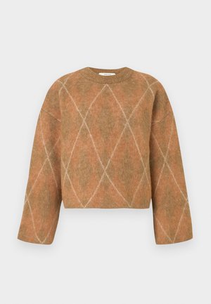 Oversized, cropped genser i varm brun med diamantmønster. Laget av mykt strikkemateriale. Har rund hals og vide ermer.