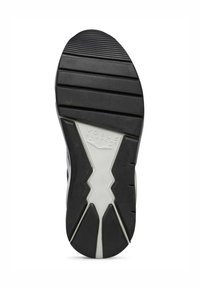 Semelle de chaussure en caoutchouc avec un motif de traction en zigzag. Présente une couche extérieure noire et une section intermédiaire blanche avec une marque. Design robuste et texturé.