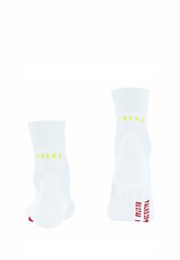 Chaussettes blanches à la cheville avec "FALKE" en néon jaune sur la bordure, avec un logo rouge contrastant au niveau du talon, texture lisse et design côtelé.
