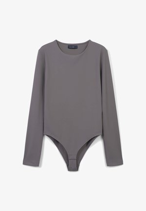 Body a maniche lunghe di colore grigio. Tessuto morbido ed elastico con scollatura rotonda e aperture delle gambe alte. Presenta dettagli di cucitura minimal.