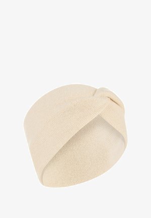 Gehaakte hoofdband in lichtbeige met een gedraaide voorkant. Zachte textuur, rekbare stof, geschikt voor verschillende hoofdmaten.