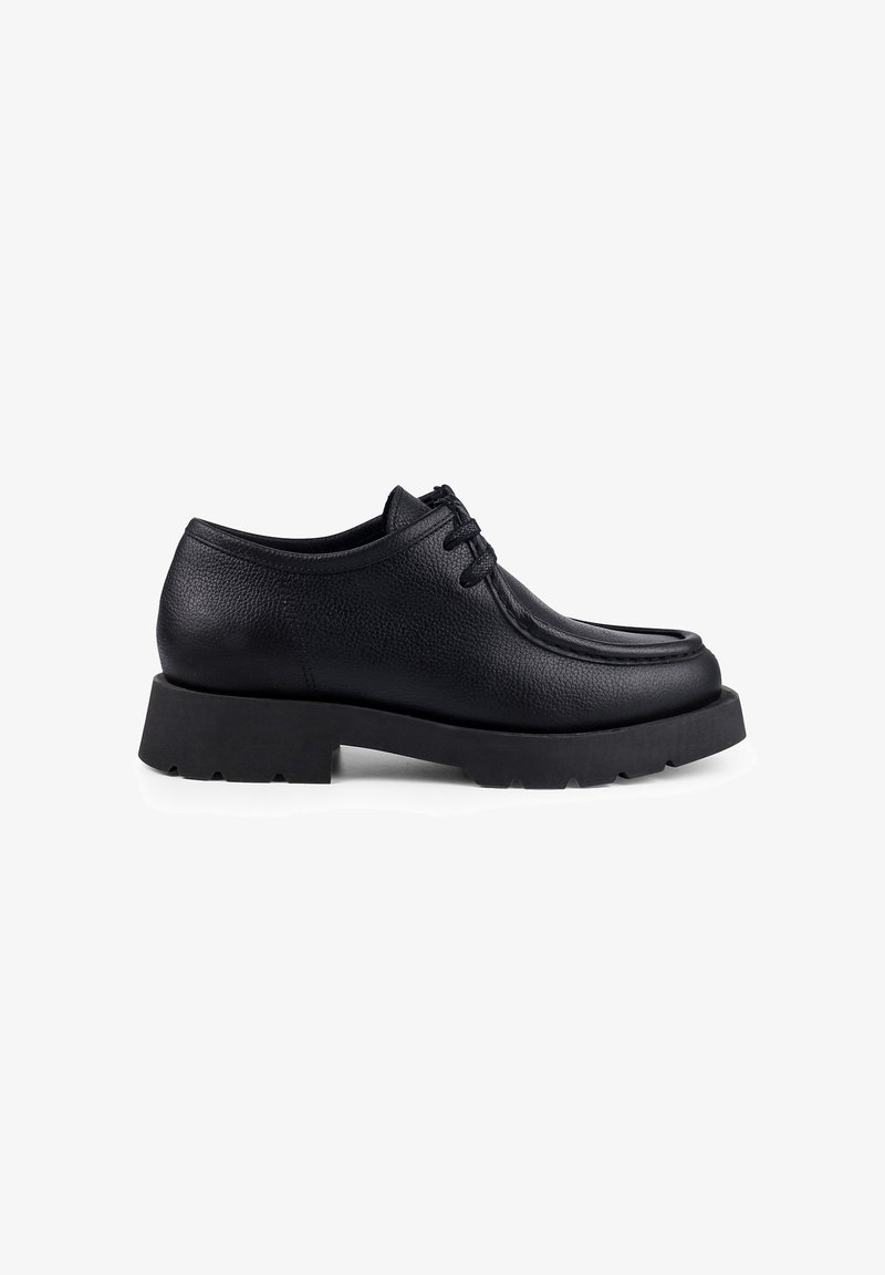 Black leather lace-up shoe with a textured finish, rounded toe, and thick, rugged sole featuring a patterned tread for grip.