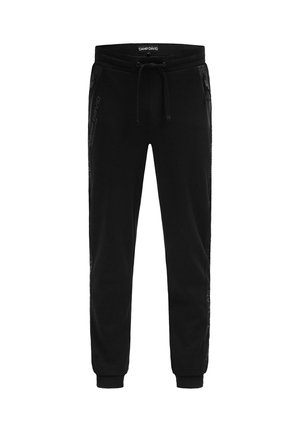 Black jogger pants with elastic waistband and drawstring, side zip pockets, cuffed ankles, and branded logo along the side seams.