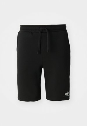 Fekete pamut rövidnadrág, rugalmas derékkal, húzózsinórral, oldalzsebekkel, és fehér logó részlettel az alsó szegélyen. Sima textúrájú.