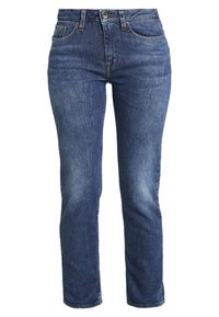 Donkerblauwe denim jeans met een rechte snit, voorzien van vijf zakken, een ritssluiting en subtiele vervaging langs de bovenbenen en knieën.