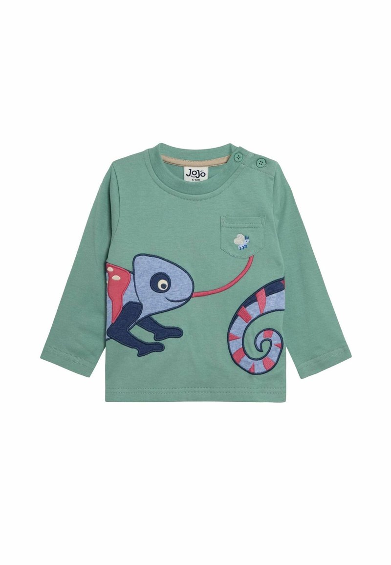 Groen shirt met lange mouwen met een kameleonafbeelding met een opgerolde staart en knoopdetails op de schouder. Gevoed stof met een zak.