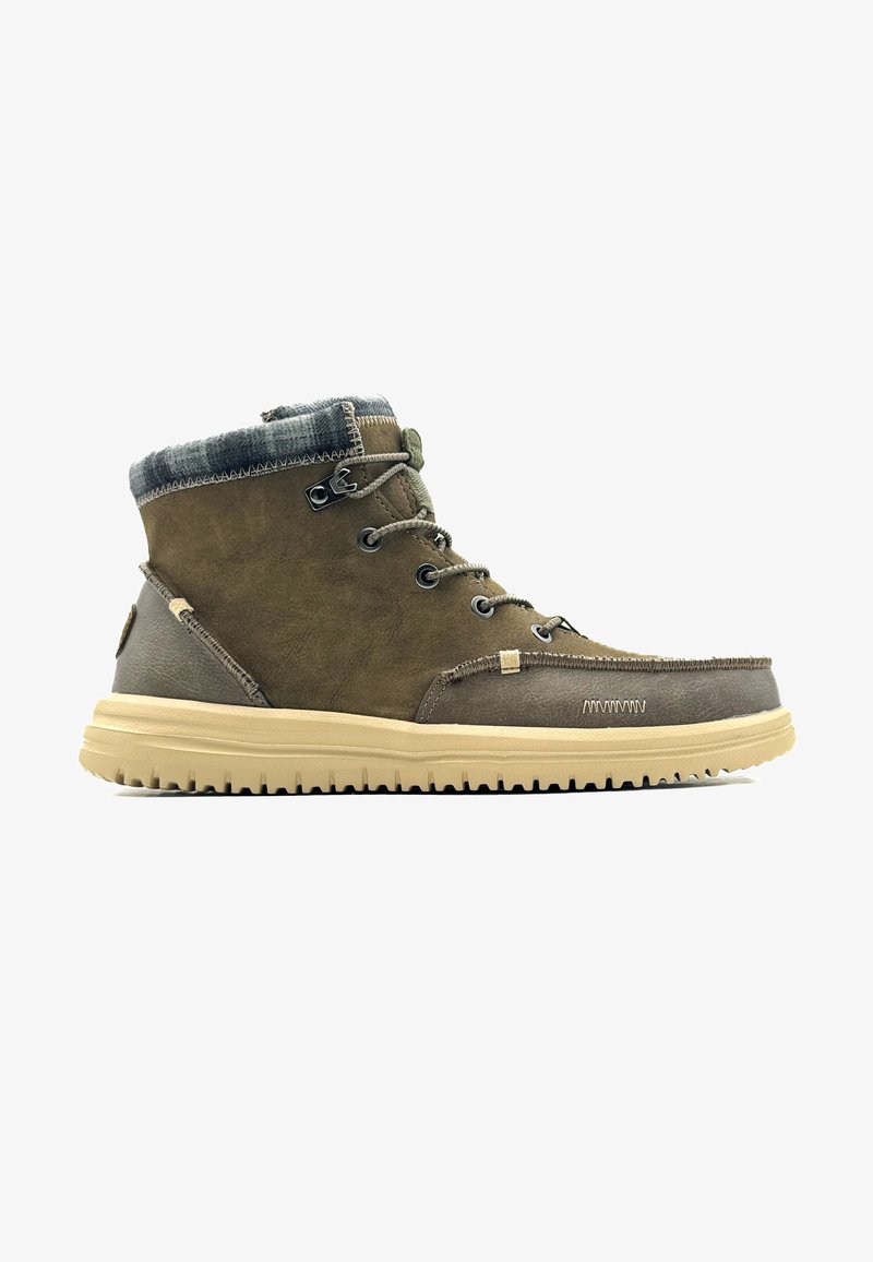 Bottes de cheville en cuir brun avec un col en tissu gris, design à lacets et semelle en caoutchouc beige présentant un motif de grip texturé.