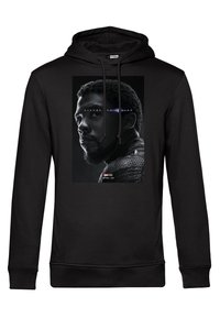Sudadera negra con un gráfico en la parte delantera del perfil de un personaje, con el texto "VENGADORES: LOS CAÍDOS" y un área del cuello con un patrón.