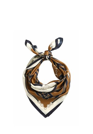 Foulard carré en soie avec motifs géométriques et chaînes bleu marine, marron et blanc, plié et noué en un nœud lâche.