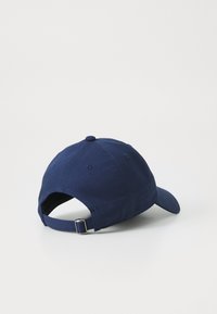 Peak Performance GROUND UNISEX - Pet - blue shadow