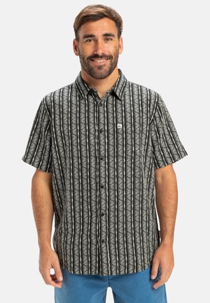 Short-sleeved, black shirt with vertical white floral patterns and button closure; features a small logo on the left chest.