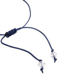 Cordon bleu marine avec un nœud au centre, comportant deux perles transparentes et facettées à chaque extrémité, suggérant un accessoire décoratif.