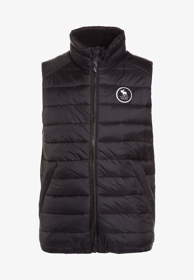 Czarna pikowana kamizelka z wysokim kołnierzem, zapinana na zamek błyskawiczny z przodu, z pionowym wzorem pikowania. Posiada okrągłe logo z łosiem i rokiem 1892.