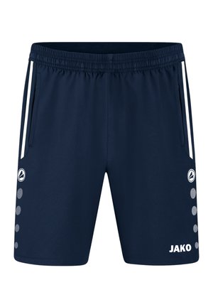 Granatowe sportowe spodenki z białymi paskami po bokach, elastycznym pasem, przednimi kieszeniami, okrągłym logo oraz napisem "JAKO" na prawej nodze.