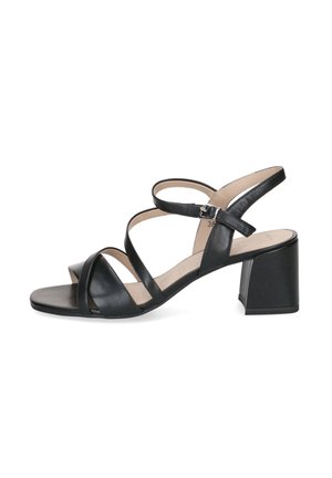 Schwarze Leder-Pumps mit geschlossener Spitze, gekreuzten Riemen, verstellbarem Knöchelriemen und Blockabsatz. Glatte Textur mit minimalistischem Design.