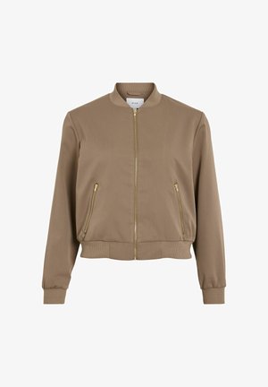 Brun bomberjakke med lynlås foran, ribbede manchetter og kant, samt to frontlommer med gyldne lynlåse. Glat stofstruktur.