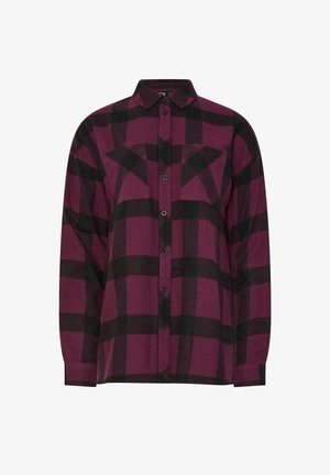 Langærmet skjorte med krave, der har et stort ternet mønster i lilla og sort samt to brystlommer.