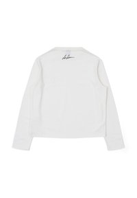 White long-sleeve shirt made of cotton, featuring a round neckline and a subtle signature detail at the upper back. Smooth texture.