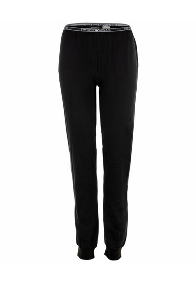Pantaloni sportivi neri con cintura elastica, caratterizzati dal logo bianco di Emporio Armani, caviglie stringate, texture morbida e vestibilità rilassata.