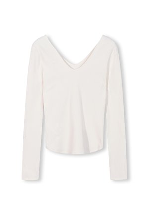 Witte geribbelde top met lange mouwen, een V-hals en een aansluitende pasvorm. Beschikt over een zachte textuur en een cropped lengte.