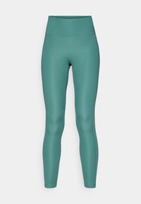 Teal leggings med høy midje, laget av glatt, elastisk stoff. Har flate sømmer og en tettsittende design for komfort og bevegelse.