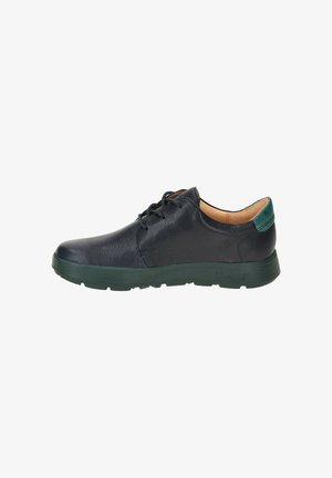 Black leather low-top sneaker with dark green rubber sole and heel accent, featuring lace-up closure and cushioned interior lining.