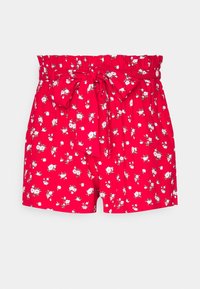 Shorts rossi con fiori, dotati di vita elasticizzata e dettaglio a fiocco. Presentano piccoli motivi di fiori bianchi e verdi su uno sfondo uniforme.
