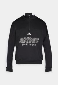 Μαύρο αθλητικό πουλόβερ Adidas με ψηλό γιακά, φερμουάρ στο ένα τέταρτο, μεγάλο λευκό λογότυπο μπροστά και λευκές ρίγες στα μανίκια.