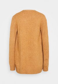Suéter de manga larga en un tono naranja dorado, con un dobladillo y puños acanalados, hecho de un material de punto texturizado con un patrón uniforme.