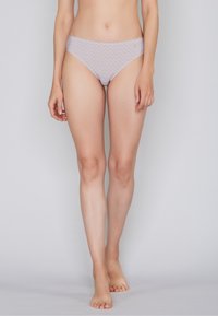 Cotton bikini underwear in light lavender with a subtle geometric pattern. Features a smooth waistband and full back coverage.